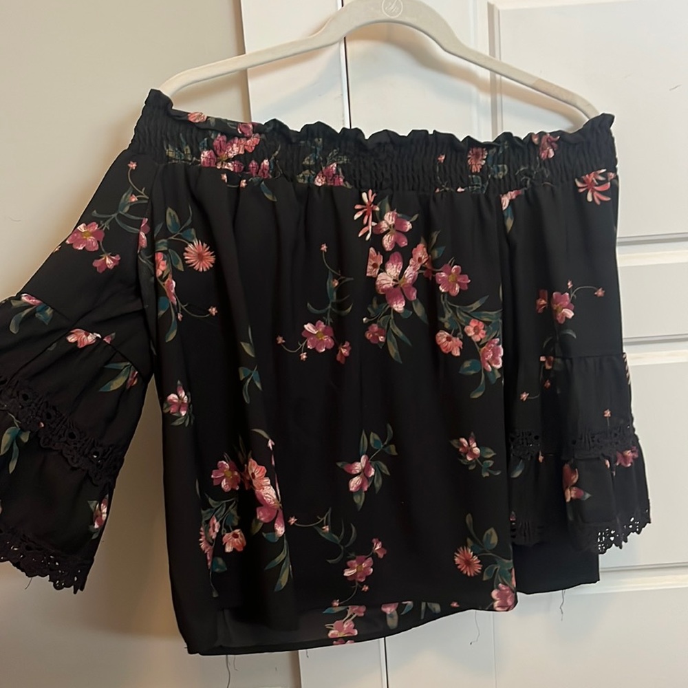 Black off the shoulder top with floral detail